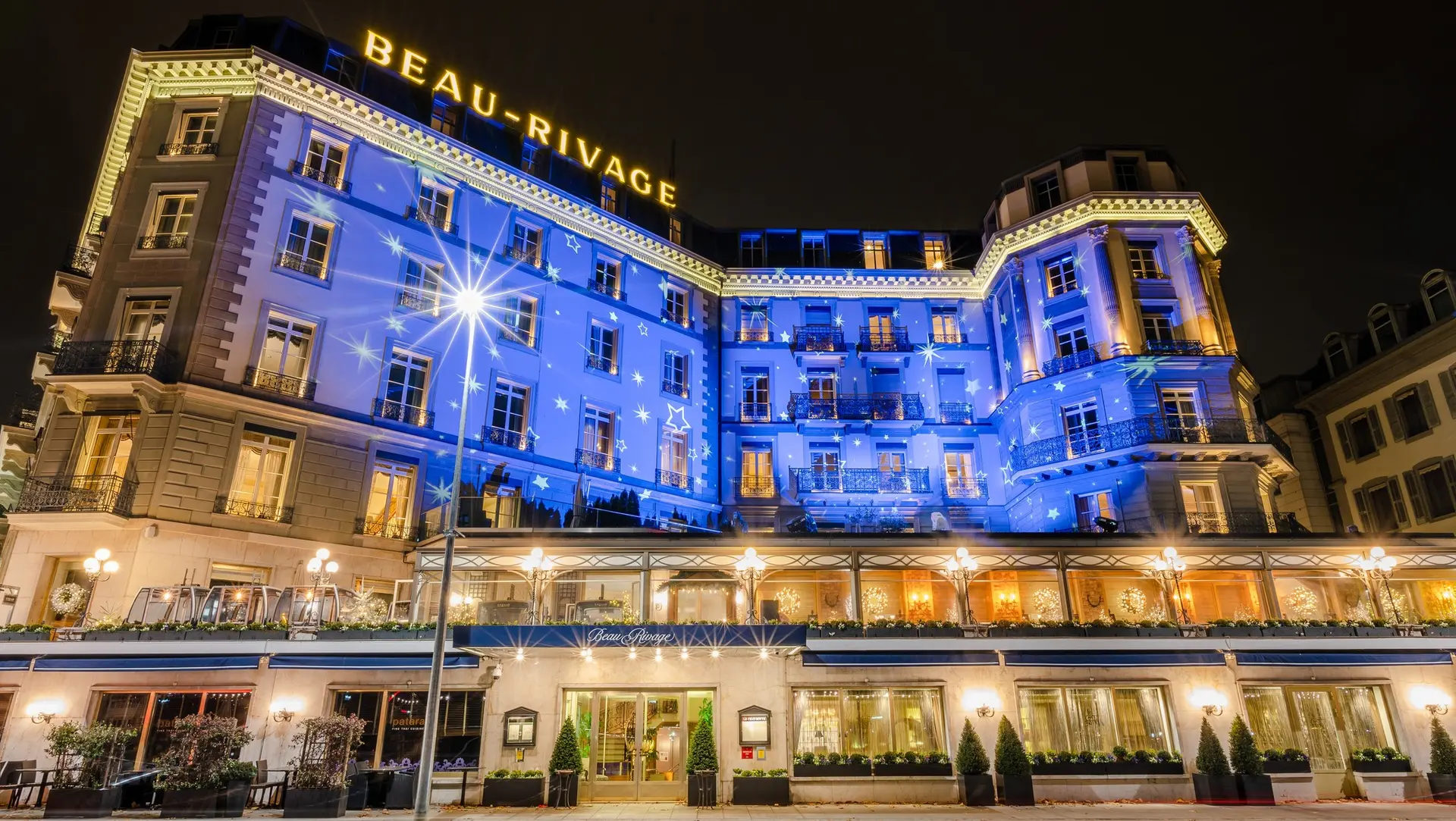 Outside The Beau-Rivage Geneva at night time