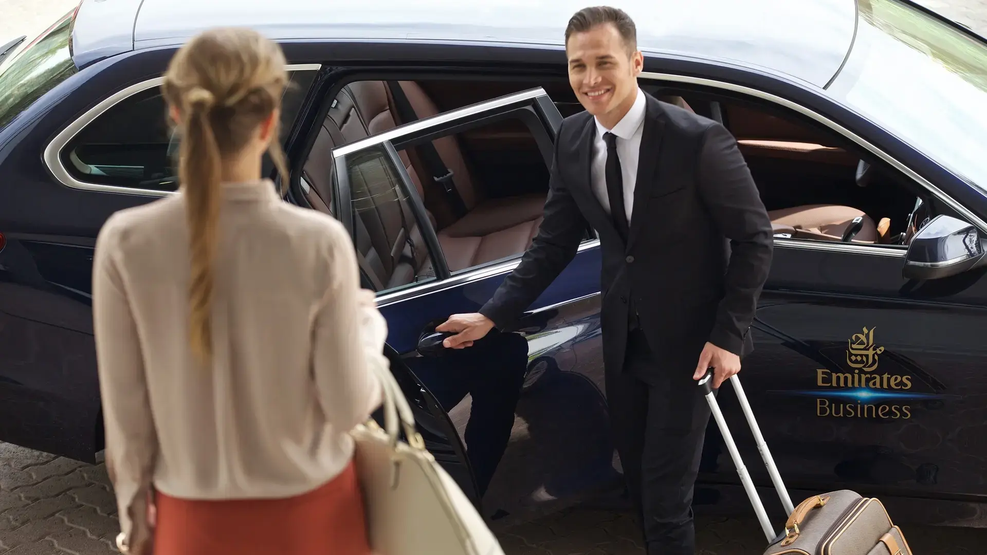 A woman waiting for businessclass Chaffeur Service