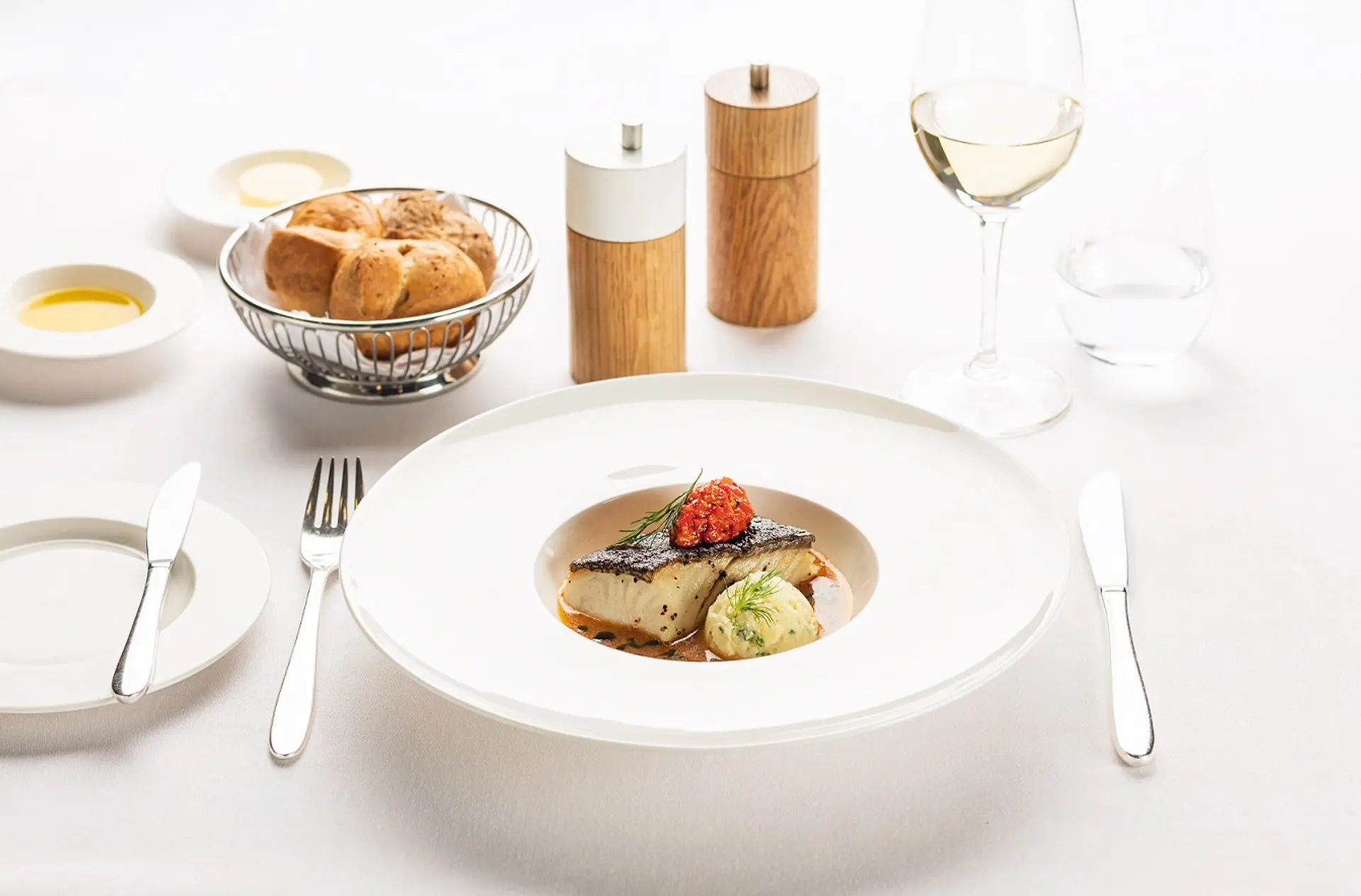 main_course_in_first_class_sauteeed_balck_cod_fillet_with_seafood_nage.jpg