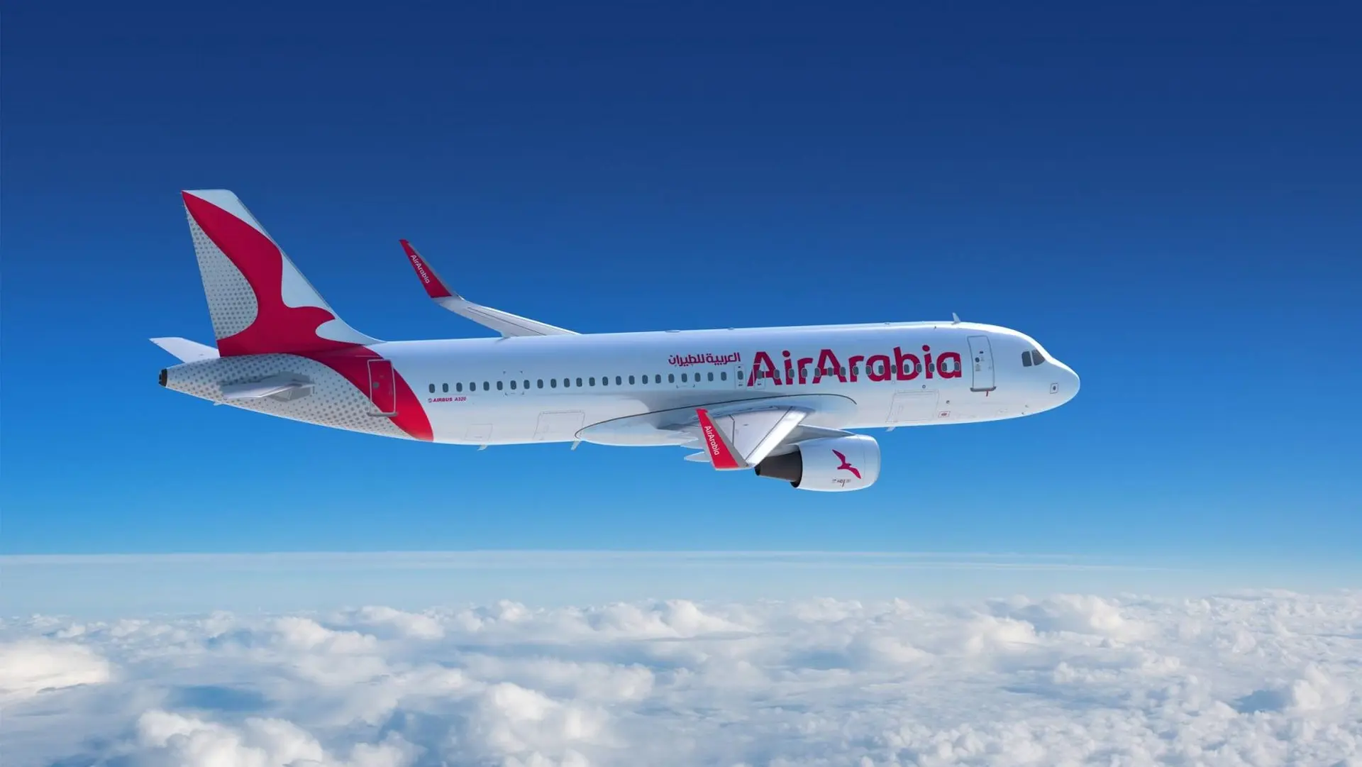 Air Arabia plane in the sky between the clouds