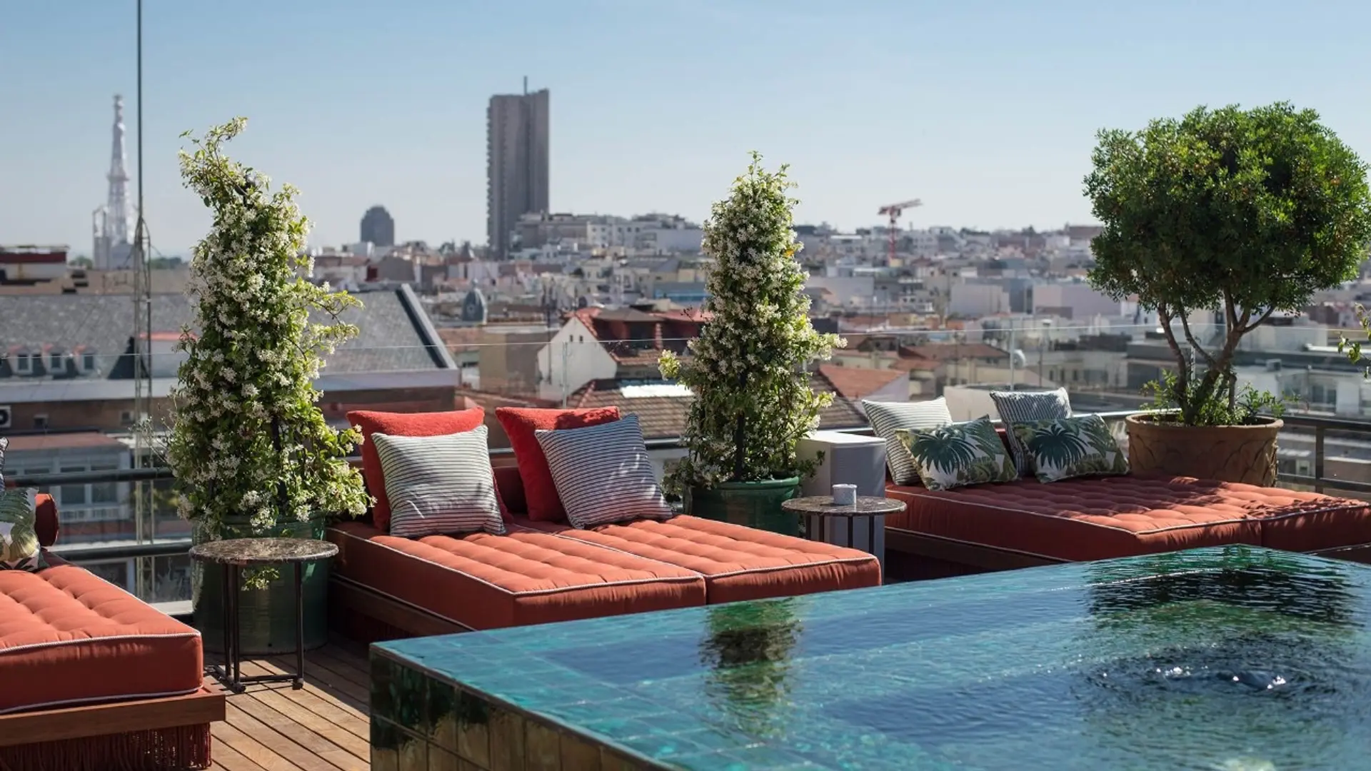 Rooftop with pool and sunbeds at BLESS Hotel in Madrid