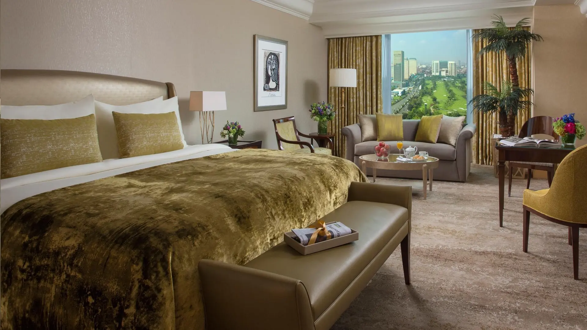 Bedroom at hotel mulia senavan jakarta with gold decor