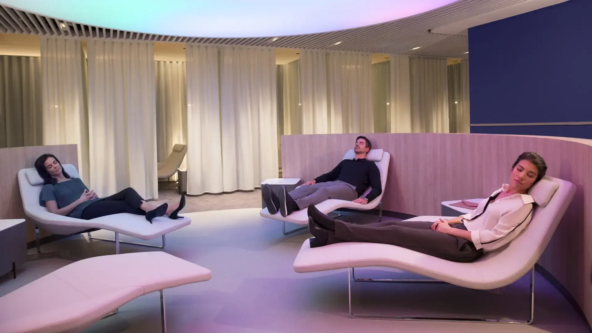 3 people sleeping at Air France - Business Lounge Charles de Gaulle, Paris