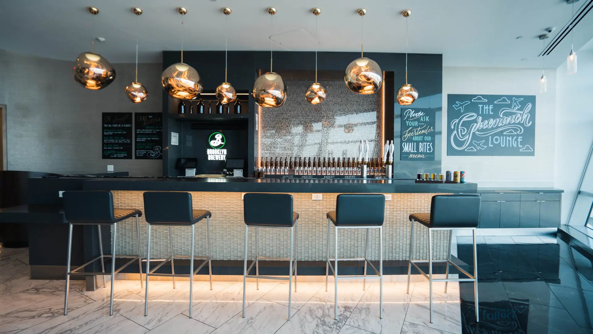 Airlines News - Hollywood comes to the new BA/AA bar at JFK