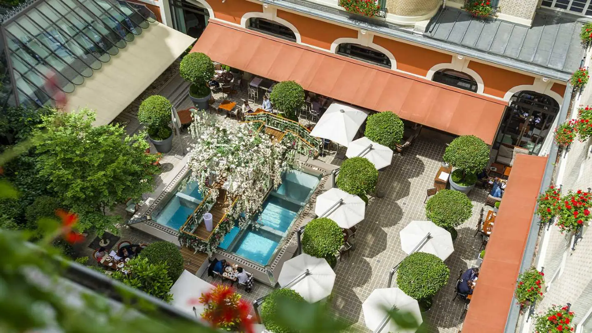 outdoor Courtyard with resturant at le royal monceau raffles paris