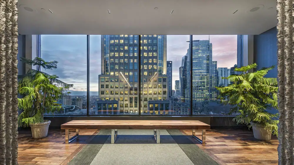 Inside Hotel Bonaventure Montreal with a large wall window with view of the city