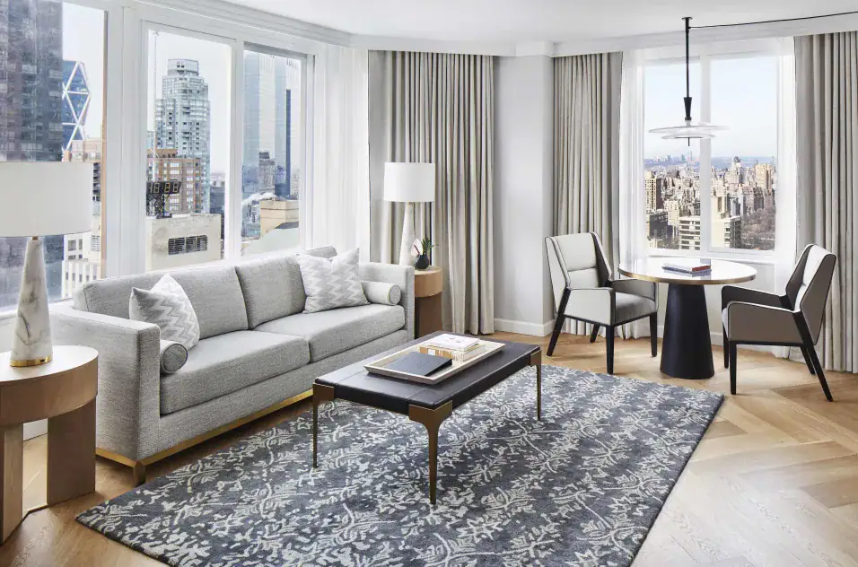 a room overlooking with wide windows at the Conrad New York Midtown