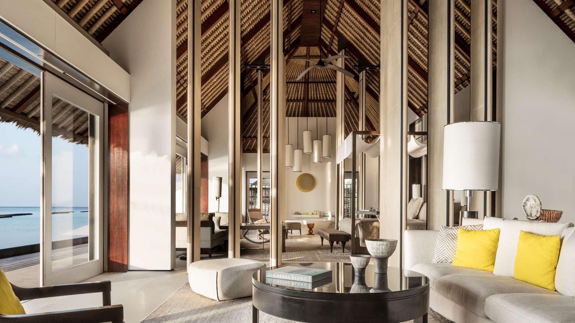 Suite with sofas, large floor to ceiling space at Cheval Blanc Randheli.