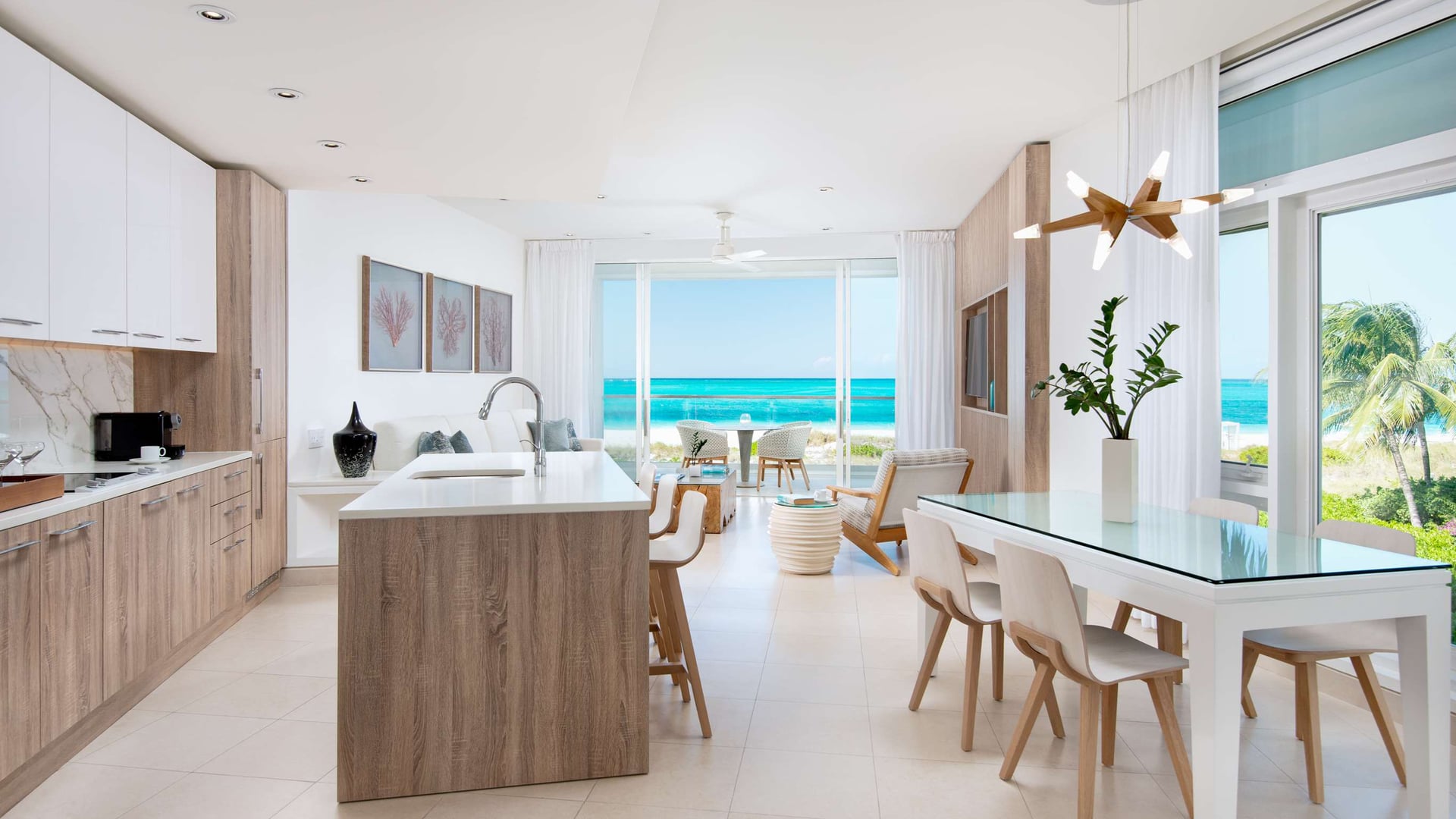 a beautiful room at the Wymara Resort Turks & Caicos overlooking the beach