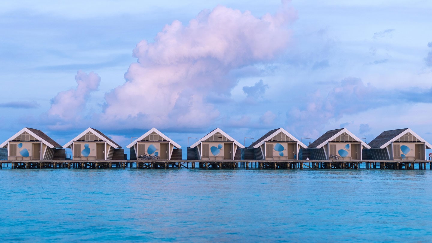 Seven cabins on the water all composed at LUX South Ari Atoll in the Maldives.