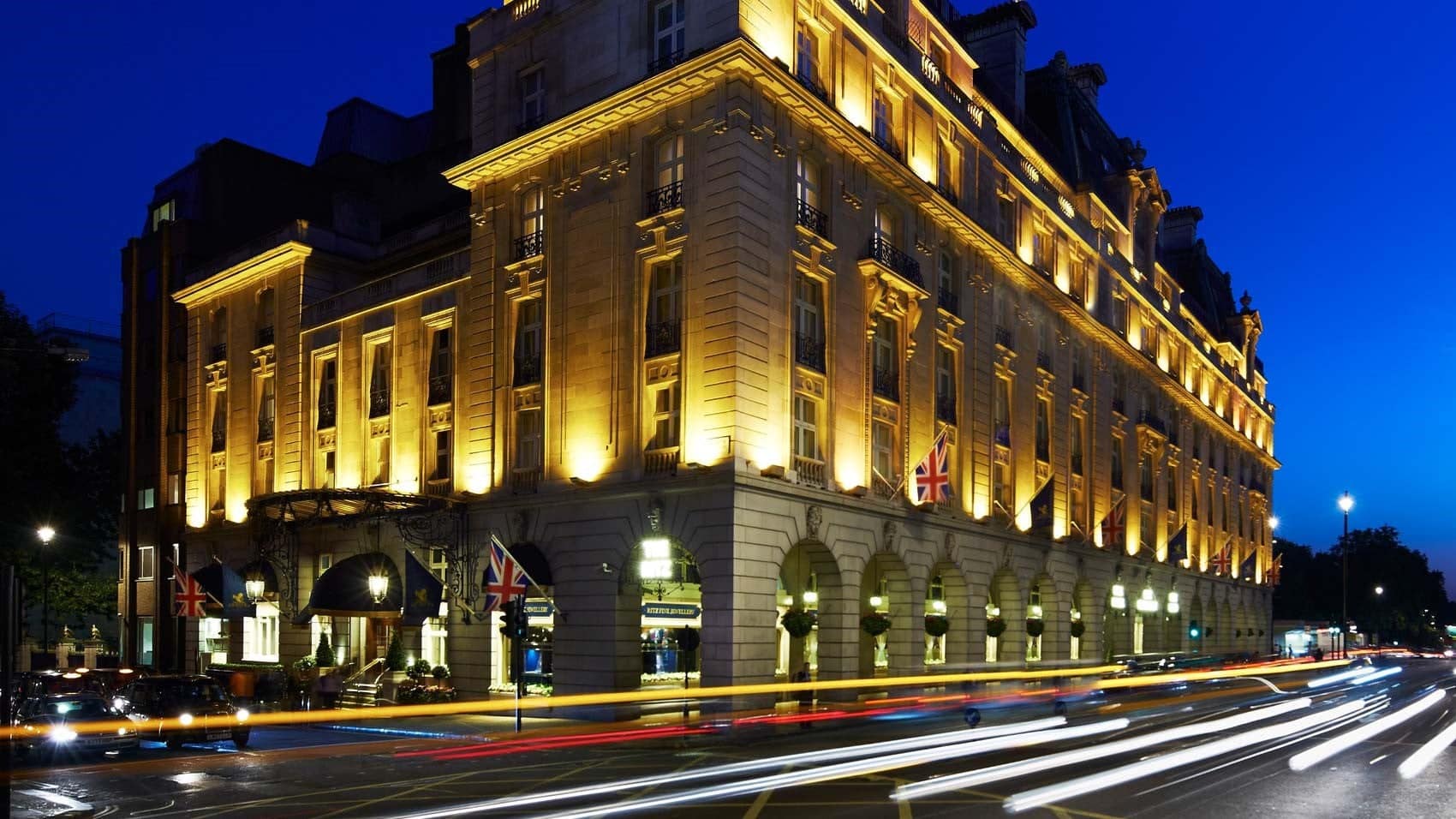 Outside view of The Ritz, London with large brick design and street