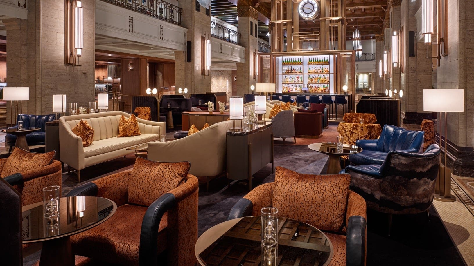 The swish clockwork lounge at the fairmont royal york hotel toronto with a bar and many seating options