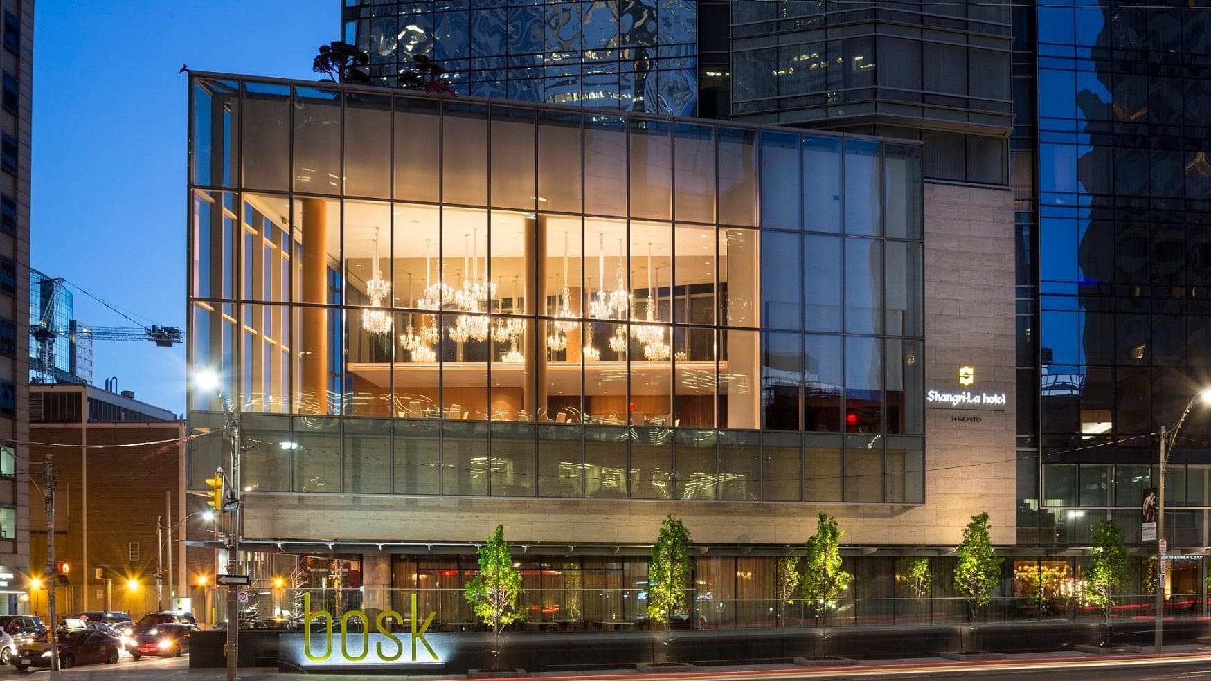 The outside of shangri-la toronto hotel made by glass and stone