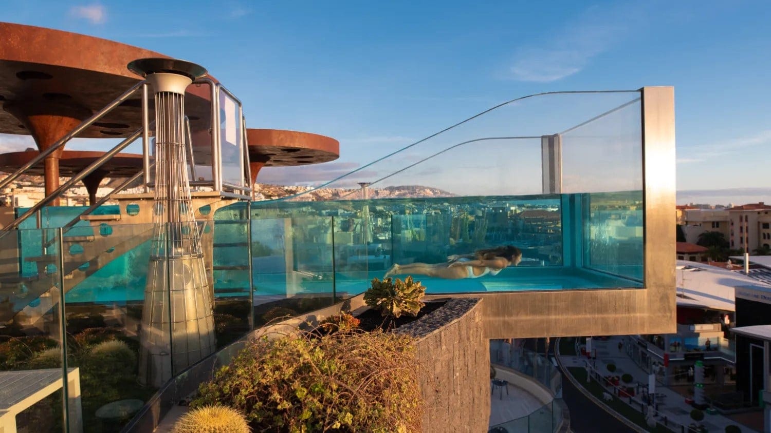 A woman using the see through pool at GF Victoria in Tenerife