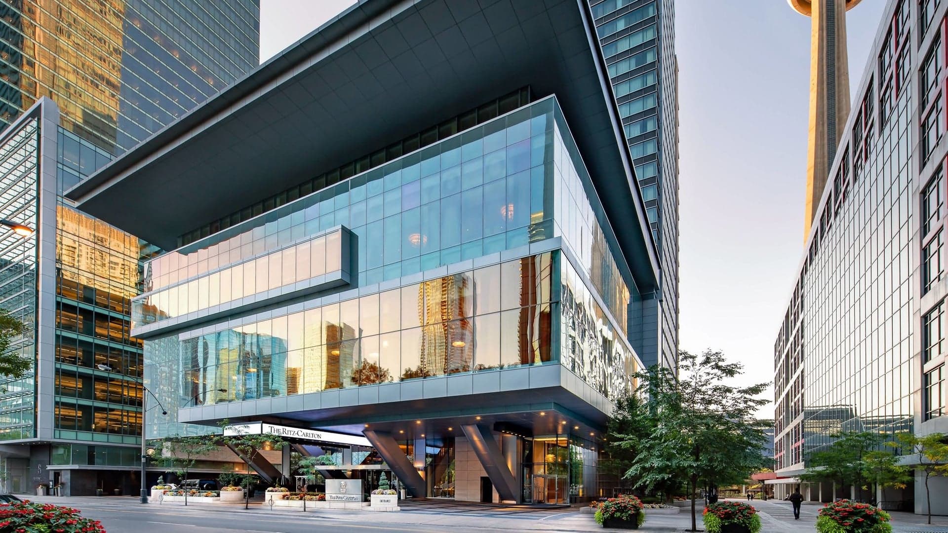 The outside of ritz carlton toronto, a modern hotel made of glass