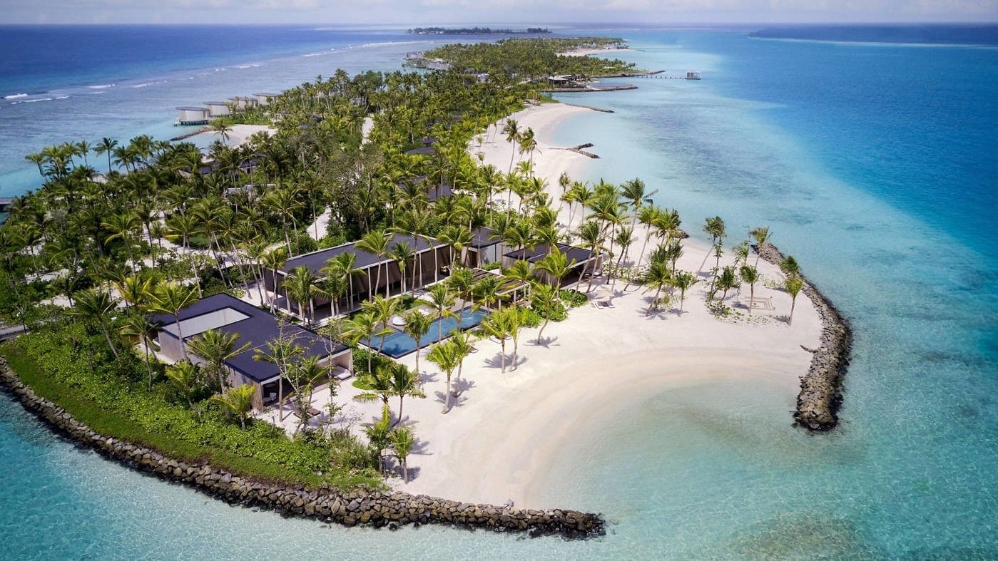 Private island in maldives with palmtrees, private beach, suites and more at The Ritz-Carlton Maldives, Fari Islands.