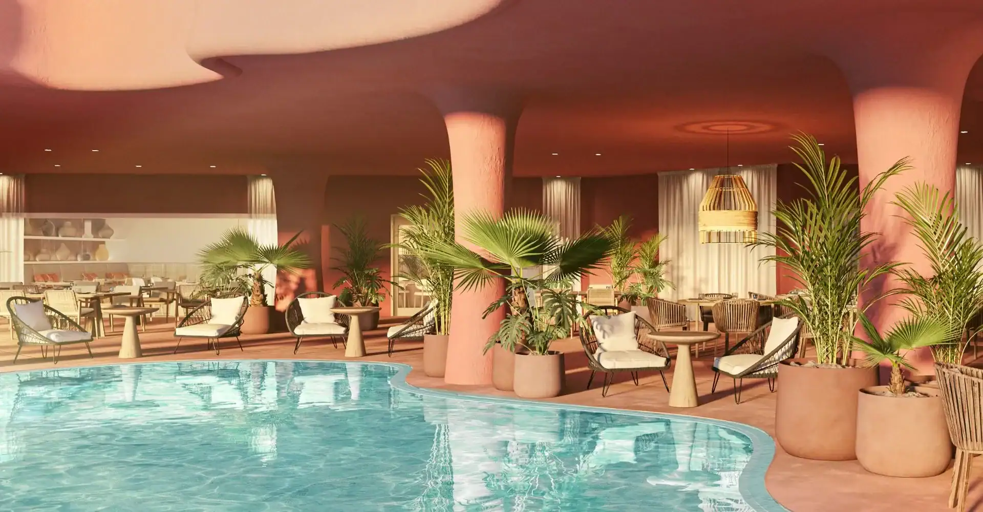 Inside pool area at Tivoli La Caleta Resort in Tenerife with outstanding plants and cool red designed walls