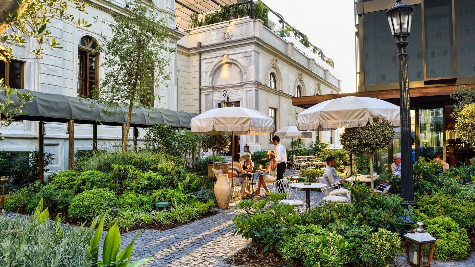 Outdoor dining and garden with a livley feel at The Trendy Soho House