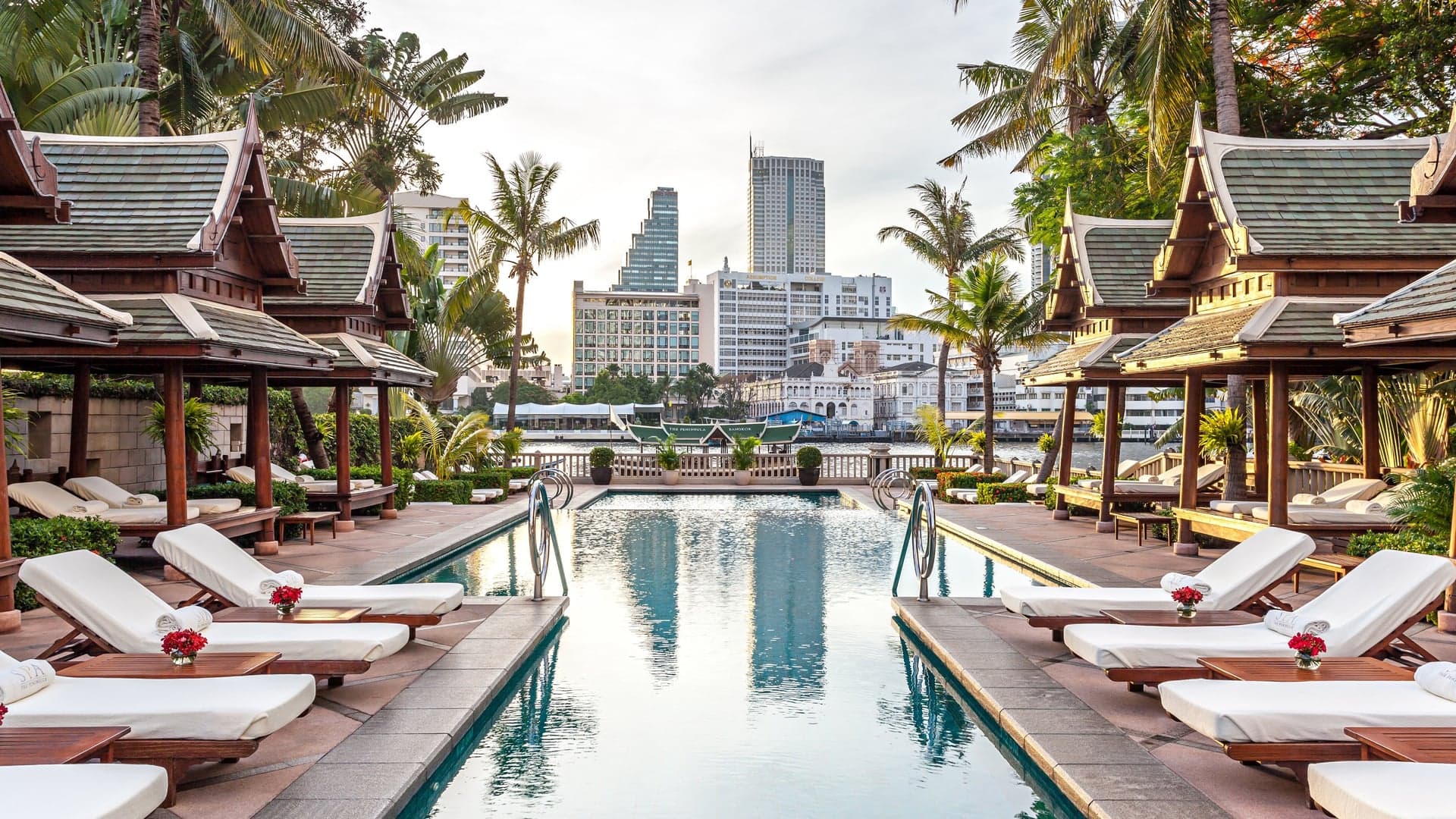 outside pool area at the peninsula bangkok