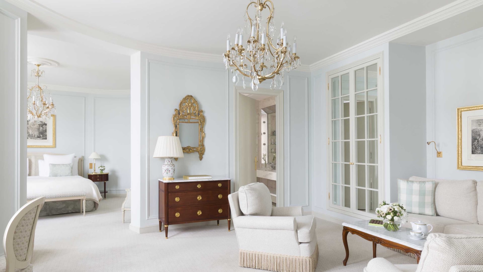 Room at hotel le bristol with a white and clean look with gold decor