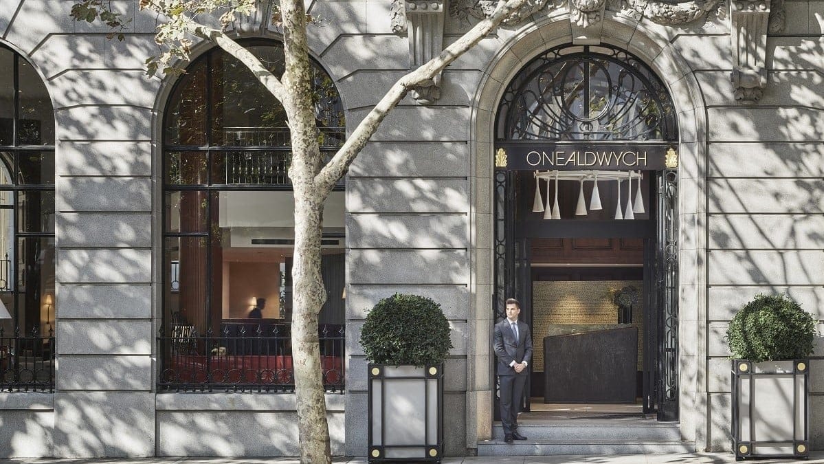 a man waiting outside One Aldwych