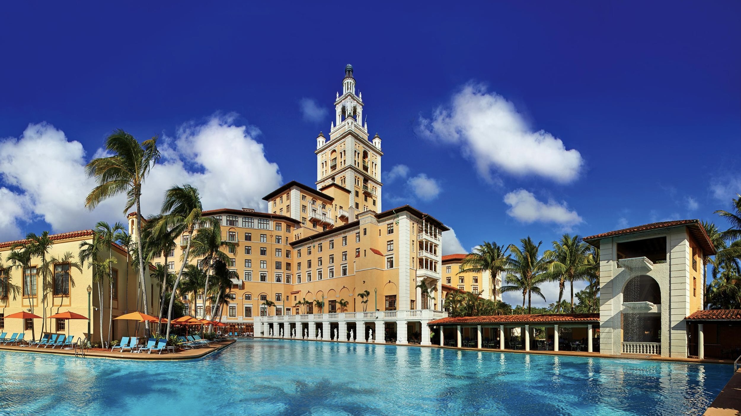View of The Biltimore Hotel from a pool perspective in Florida