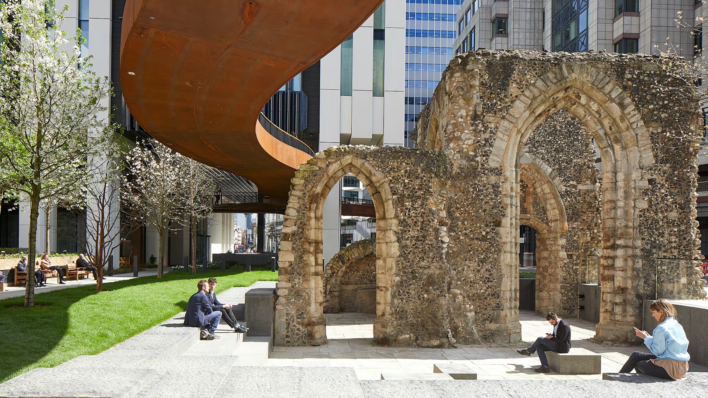 people sitting at the London Wall