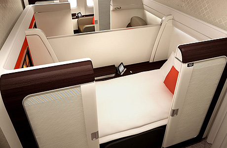 Garuda_Indonesia_B_777_300ER_First_class_2013_1.jpg Garuda_Indonesia_B_777_300ER_First_class_2013_1.jpg