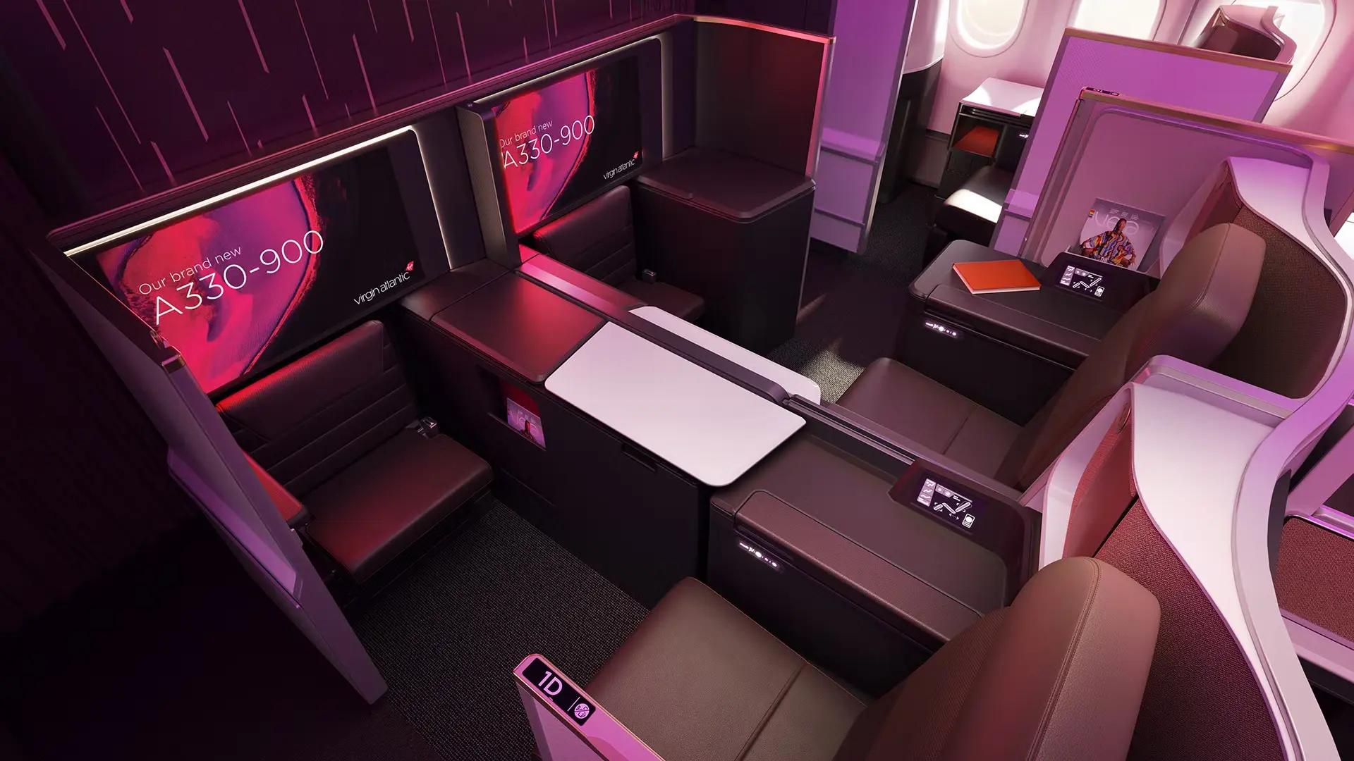two Virgin atlantic retreat suites at businessclass with a brown leather finish. And with A330-900 smart screens.