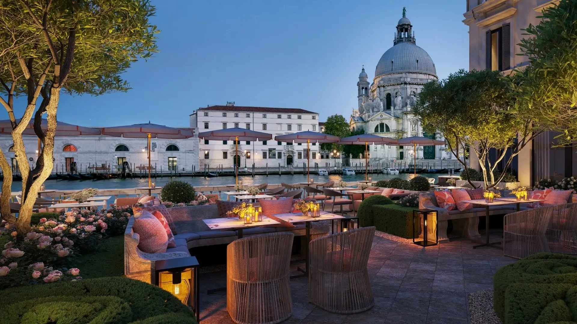St. Regis Venice hotel in the private garden and pool area at evening time