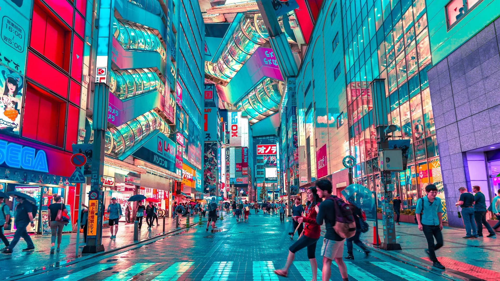 Futuristic street in Tokyo with bright artificial lightning and people walking.