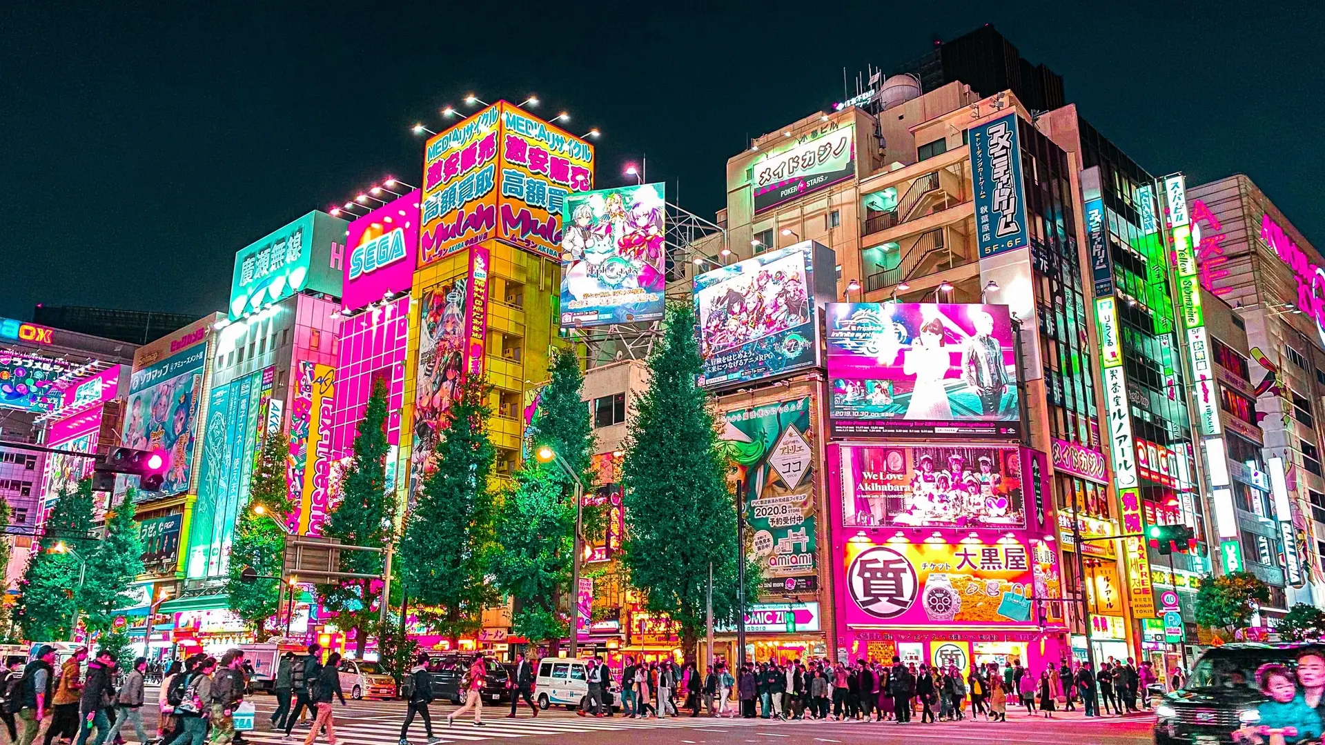 Electric Town in Tokyo, advertisements, artificial lightning and a lot of pink colours.